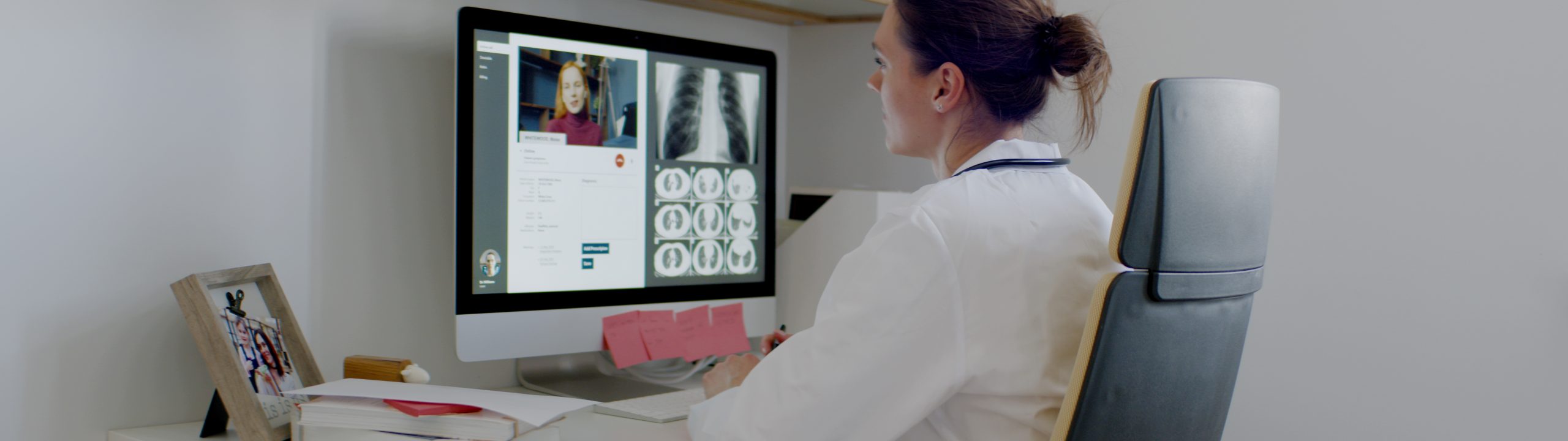 Caucasian female doctor delivering telemedicine consultation to a patient Caucasian female doctor delivering telemedicine consultation to a patient. Telehealth, telemedicine, remote consultation service. Coronavirus, COVID-19